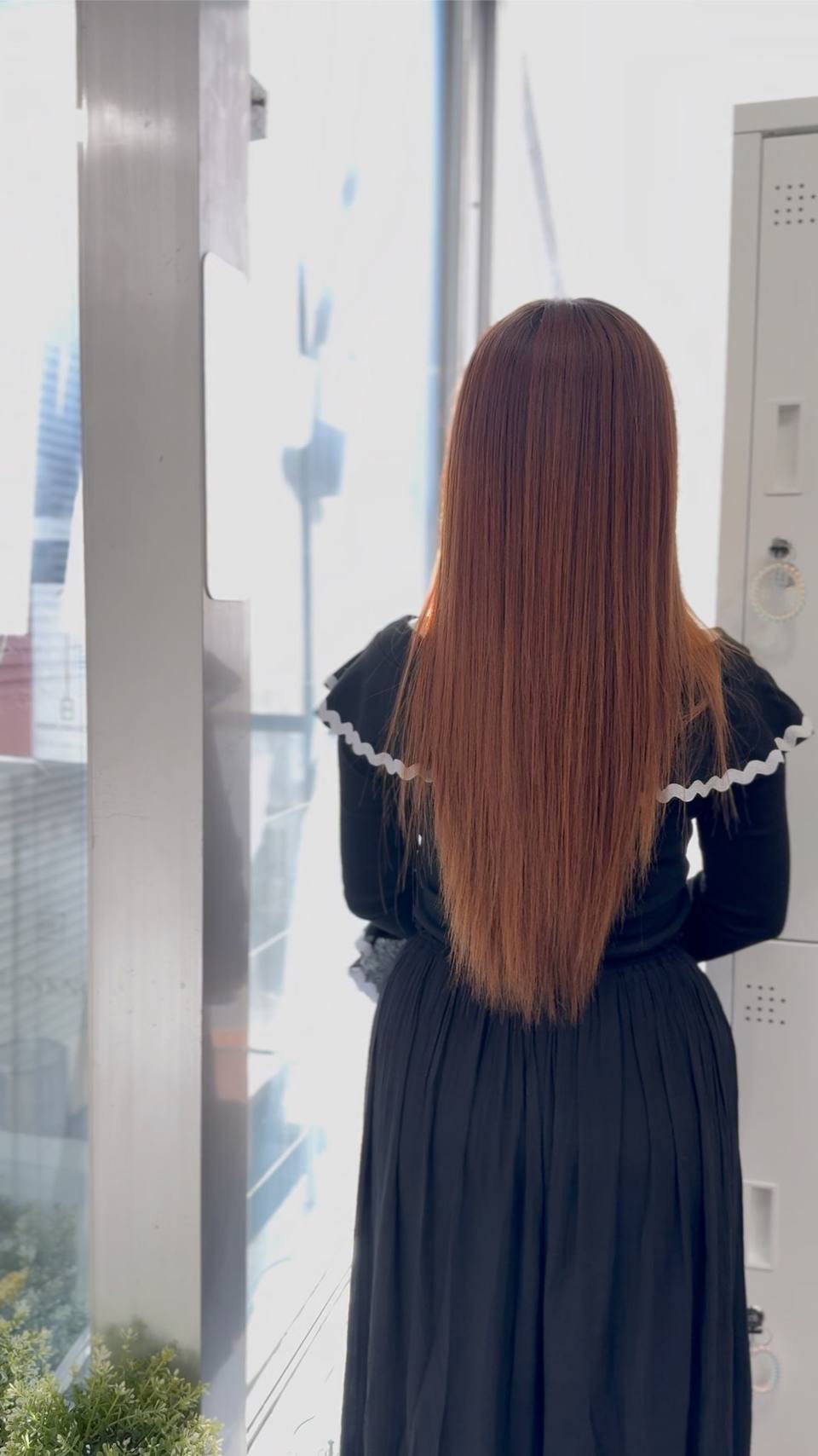 艶とまとまりのあるロングヘアの仕上がり